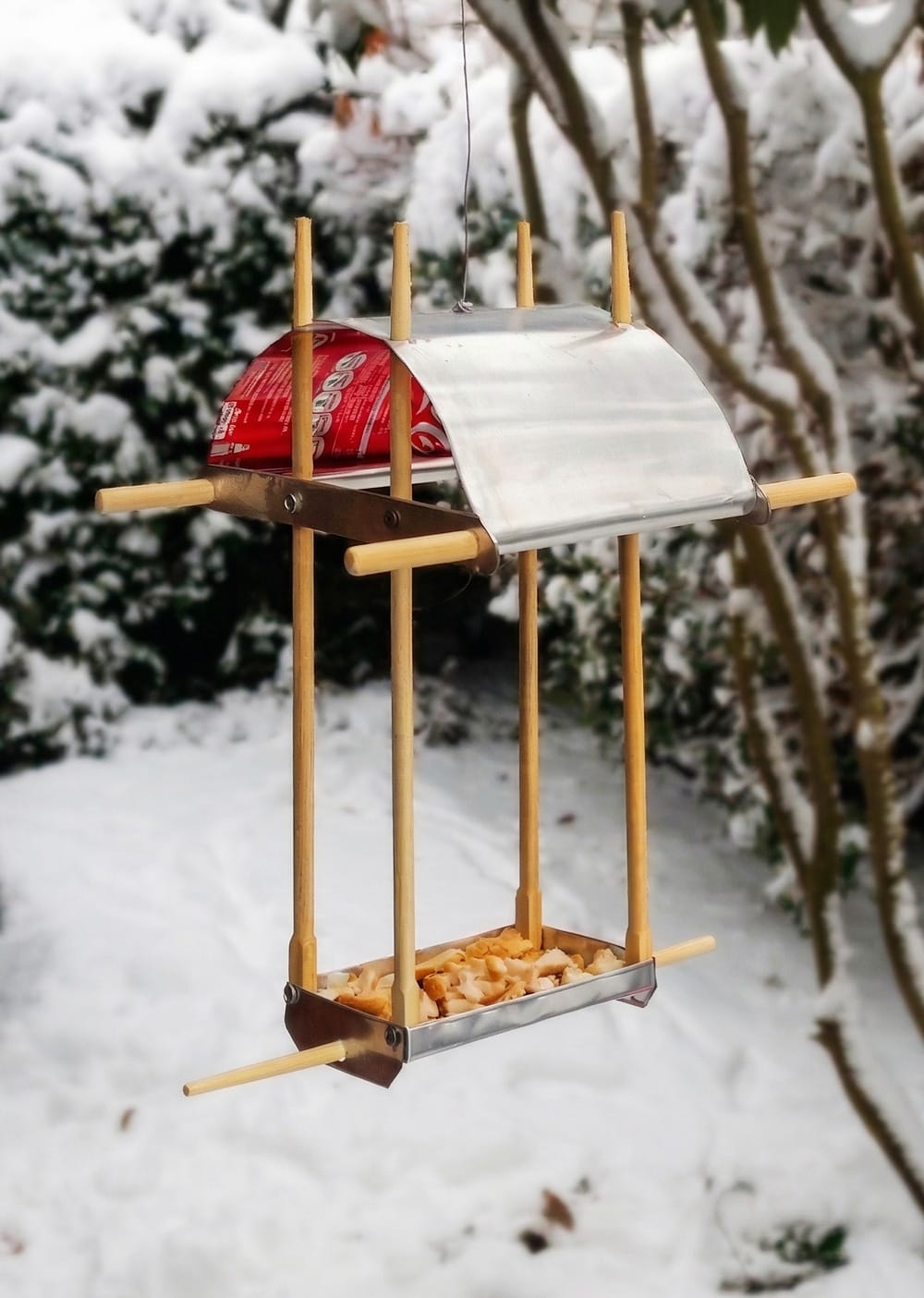 Birdfeeder made from repurposed chopsticks and soda cans