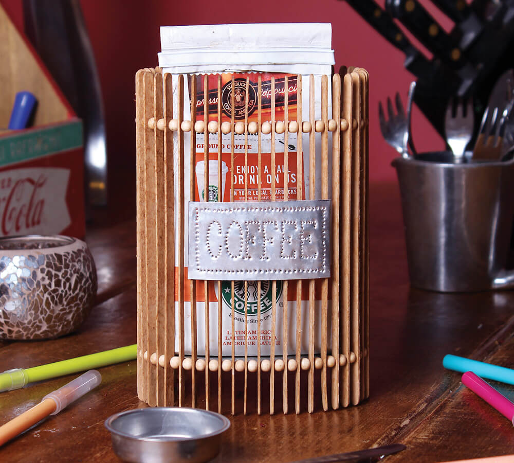 Container made from repurposed stirring sticks