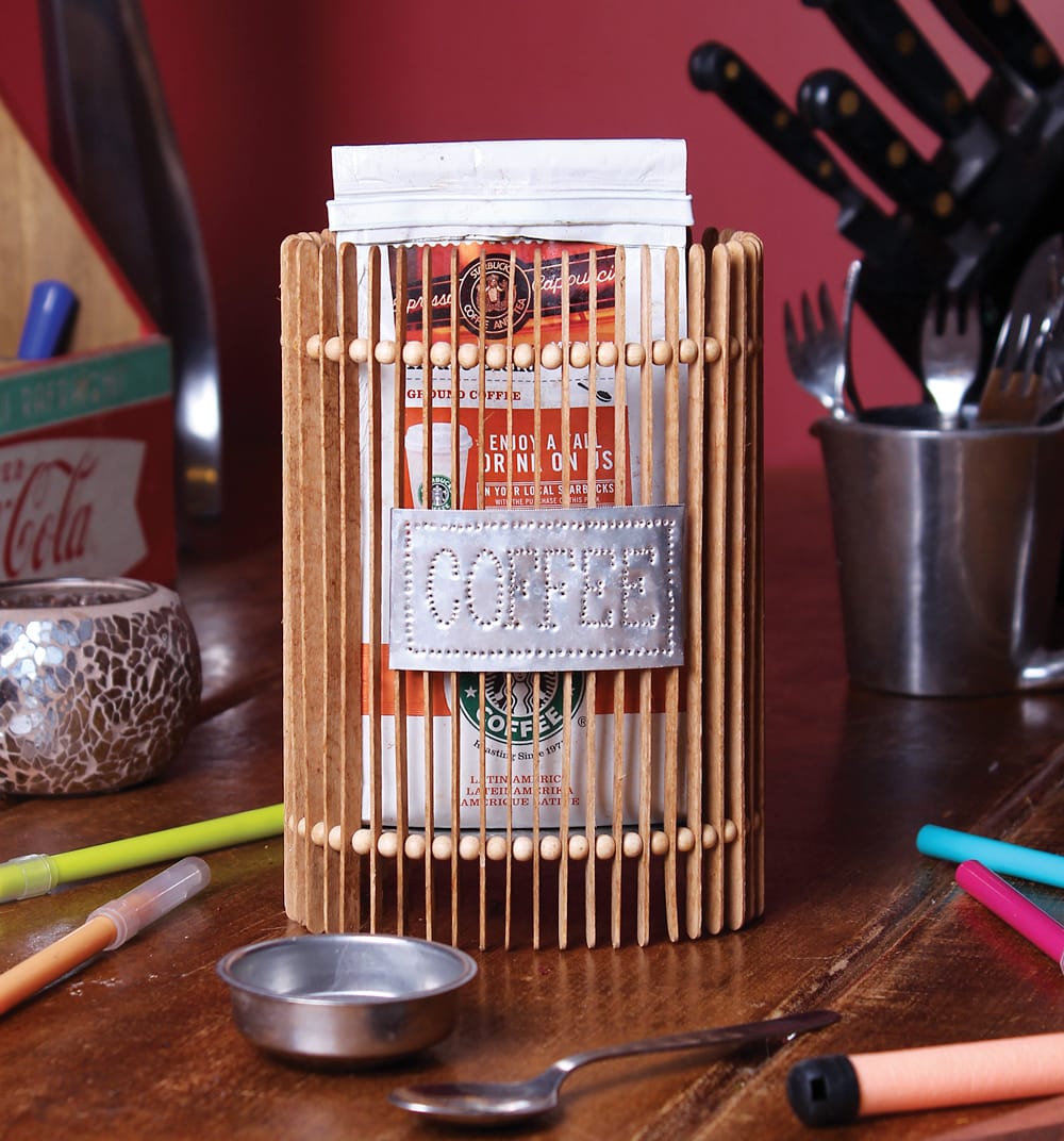 Container made from repurposed stirring sticks