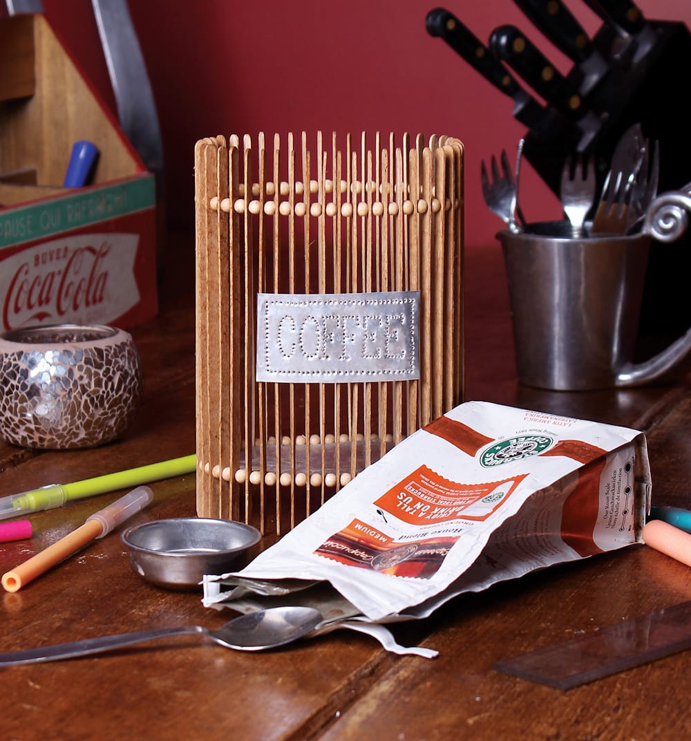 Container made from repurposed stirring sticks