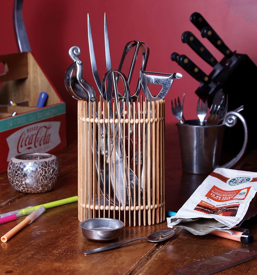 Container made from repurposed stirring sticks