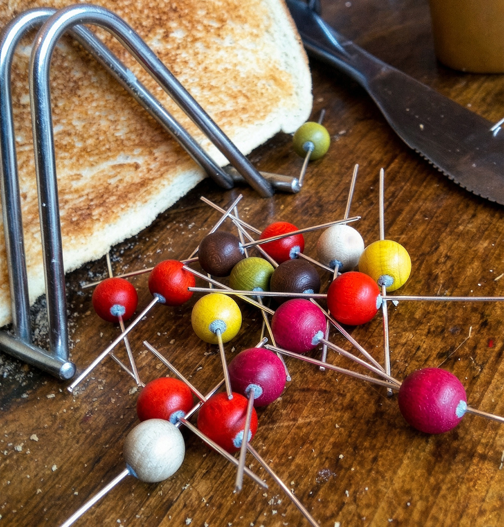 Wire and bead toast connectors